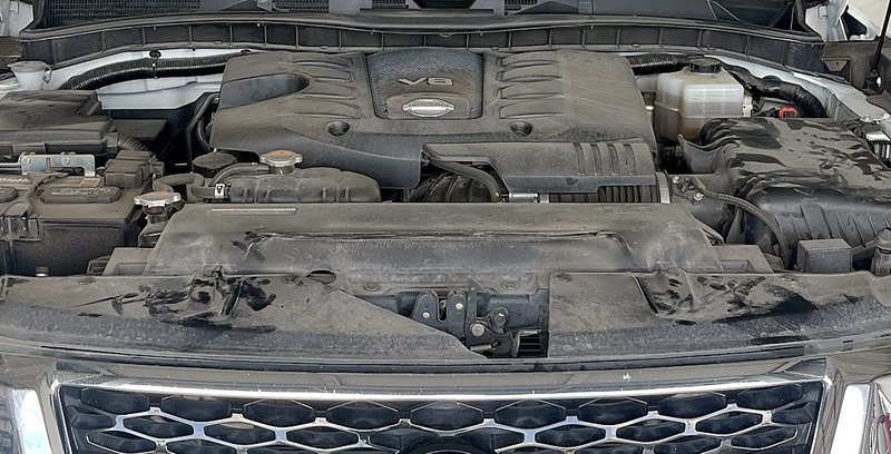 Under the hood of a Nissan in the bay